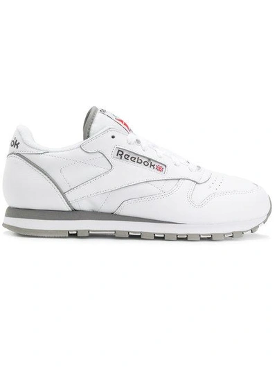 Shop Reebok Sporty Lace-up Sneakers - White