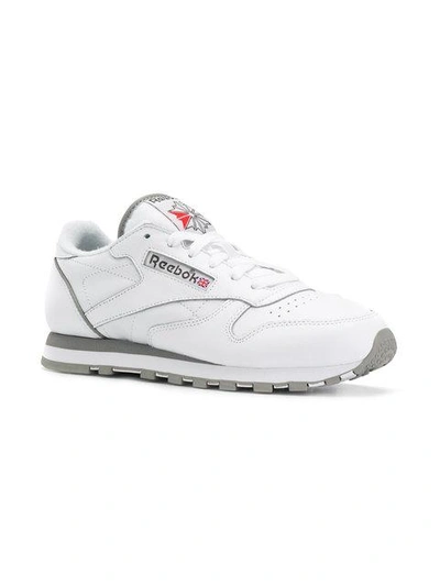 Shop Reebok Sporty Lace-up Sneakers - White