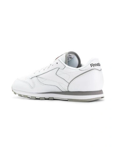 Shop Reebok Sporty Lace-up Sneakers - White
