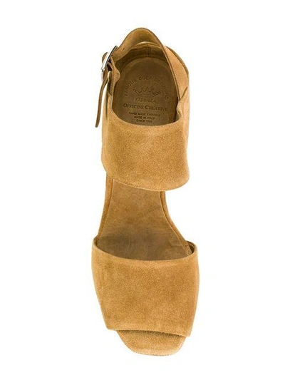 Shop Officine Creative Sling Back Buckle Sandals In Brown