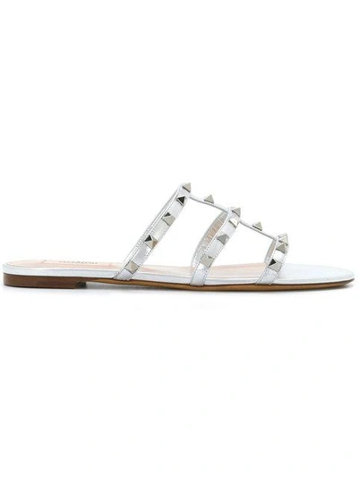 Shop Valentino Rockstud Sandals In Metallic