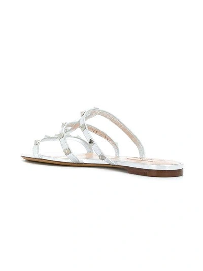 Shop Valentino Rockstud Sandals In Metallic