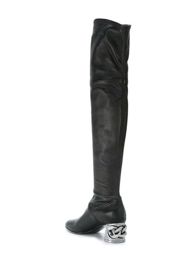 Shop Casadei Chain-embellished Heel Boots