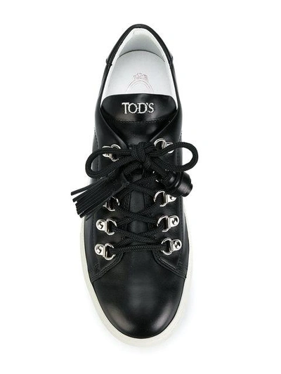 Shop Tod's Tassel Trim Sneakers In Black
