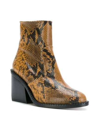 Shop Robert Clergerie Mayan Snake-skin Effect Boots In Brown