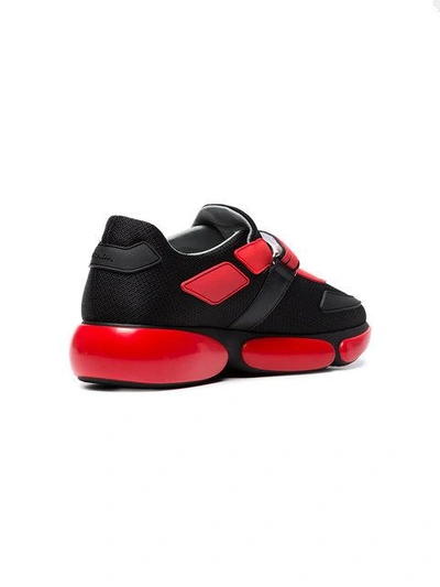 Shop Prada Cloudbust Sneakers In F0n98 Nero + Rosso