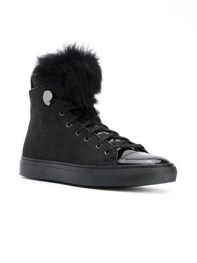 Shop Moncler High Top Sneakers In Black