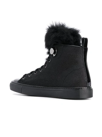 Shop Moncler High Top Sneakers In Black