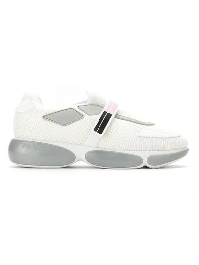 Shop Prada Cloudbust Sneakers In White