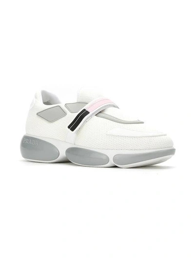 Shop Prada Cloudbust Sneakers In White