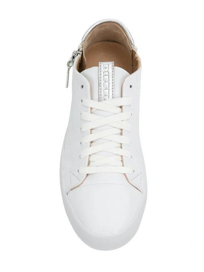 Shop Diesel Side Zip Sneakers In White