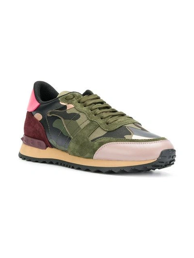 Shop Valentino Camouflage Rockstud Sneakers