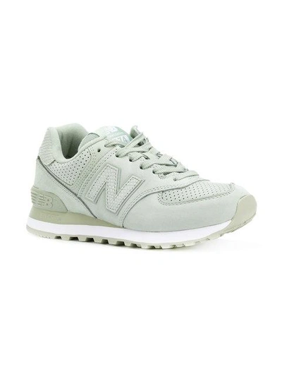 Shop New Balance 574 Sneakers - Green