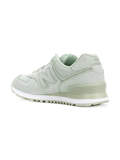 Shop New Balance 574 Sneakers - Green