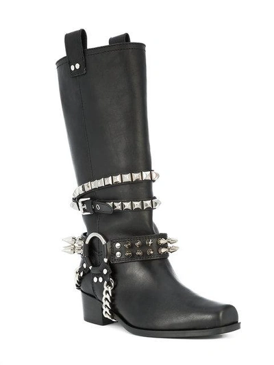 Shop Moschino Studded Biker Boots In Black