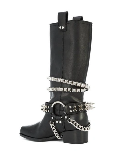 Shop Moschino Studded Biker Boots In Black