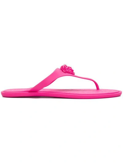 Shop Versace Medusa Head Flip Flops - Pink