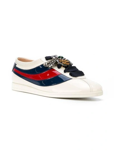 Shop Gucci Falacer Sneakers In White