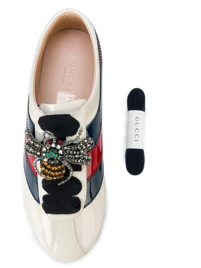 Shop Gucci Falacer Sneakers In White