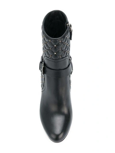 Shop Valentino Garavani Rockstud Spike Boots - Black