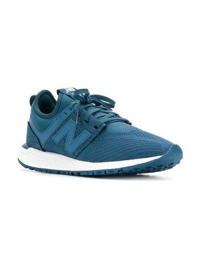 Shop New Balance 247 Classic Sneakers - Blue