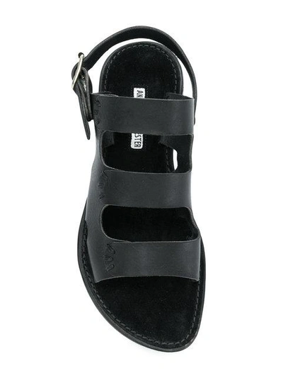 Shop Ann Demeulemeester Triple-strap Flat Sandals - Black