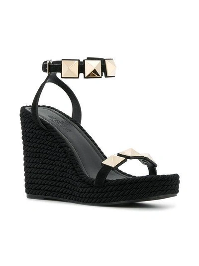 Shop Valentino Wedge Stud Sandals In Black