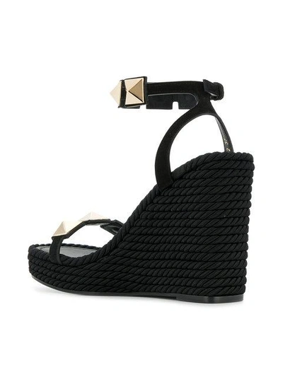 Shop Valentino Wedge Stud Sandals In Black