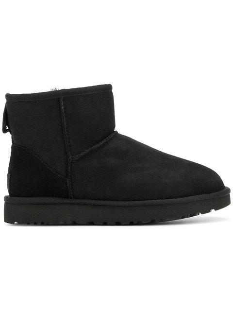 black uggs with brown trim