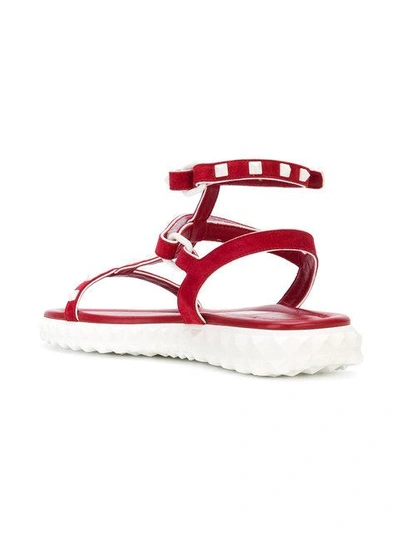 Shop Valentino Flat Rockstud Sandals - Red