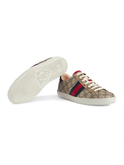 Shop Gucci Ace Gg Supreme Sneakers In Neutrals