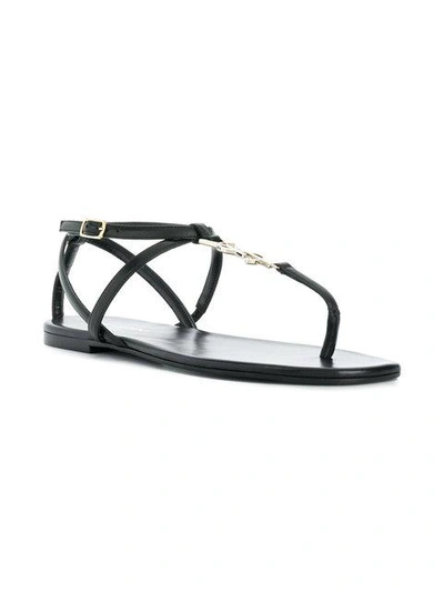 Shop Saint Laurent Monogram Plaque Sandals - Black