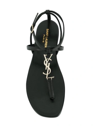 Shop Saint Laurent Monogram Plaque Sandals - Black