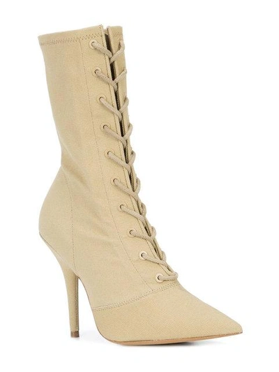 Shop Yeezy Lace Up Heeled Boots In Brown