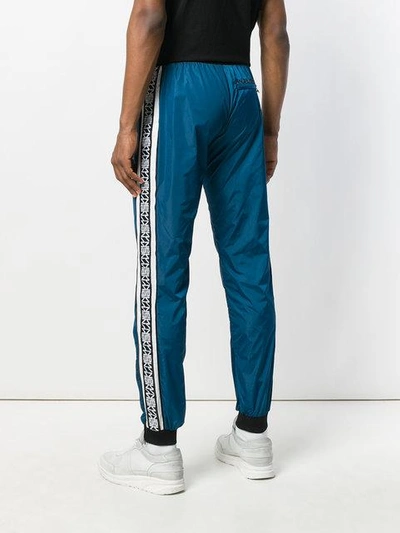 ANDREA CREWS SIDE-STRIPE TRACK TROUSERS - 蓝色