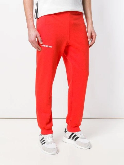 Shop Adidas Originals Gosha Rubchinskiy Gosha Rubchinskiy X Adidas Logo Trackpants - Red