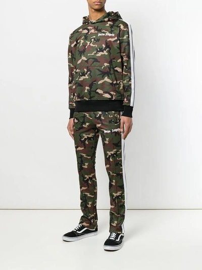 Shop Palm Angels Camouflage Print Track Pants  In Multicolour ,green