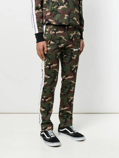 Shop Palm Angels Camouflage Print Track Pants  In Multicolour ,green