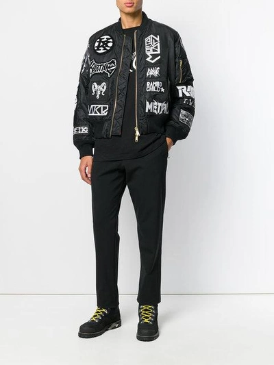 Shop Ktz All-over Patch Bomber Jacket - Black