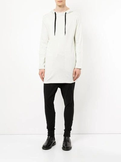 Shop First Aid To The Injured Long Line Hoodie In White