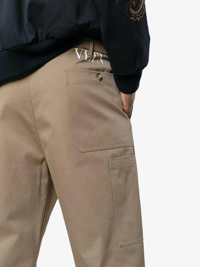 Shop Valentino Vltn Cargo Trousers In Brown