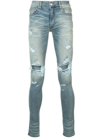 Shop Amiri Thrasher Jeans - Blue