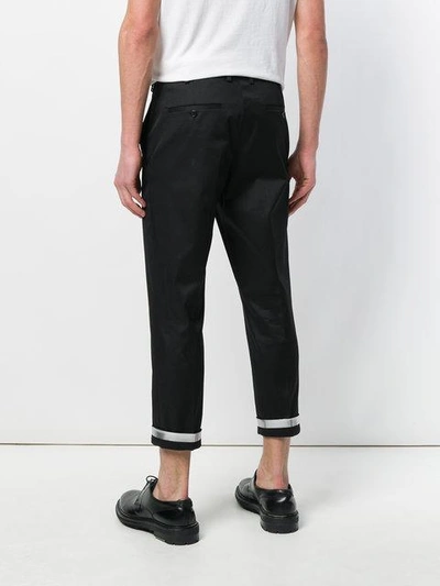 Shop Neil Barrett Contrast Cuff Trousers - Black