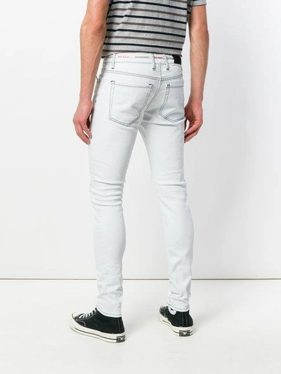 Shop Represent Destroyed Skinny Jeans In Blue