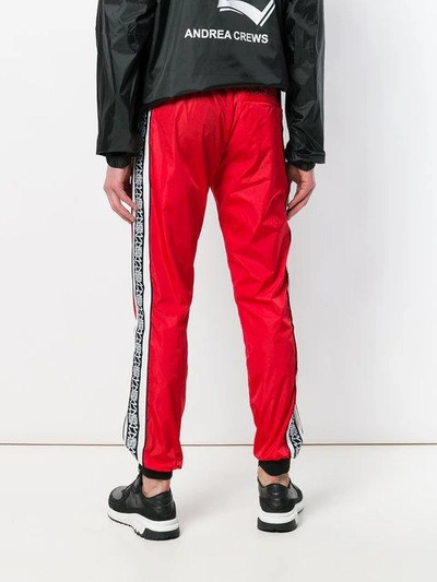 Shop Andrea Crews Side-striped Track Pants In Red