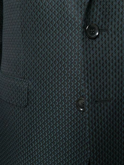 patterned three piece suit