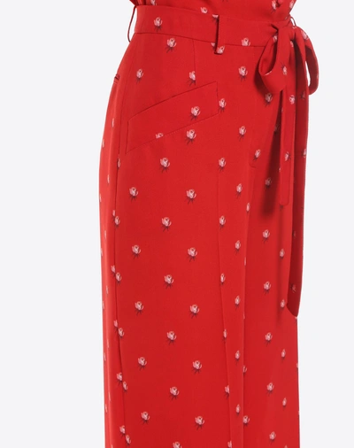 Shop Valentino Rosebud Print Pants In Red