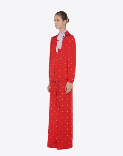 Shop Valentino Rosebud Print Pants In Red