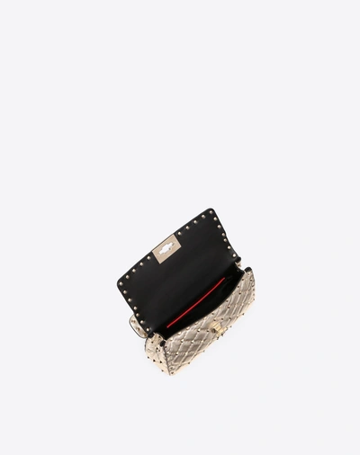 Shop Valentino Garavani Small Rockstud Spike Metallic Bag In Platinum