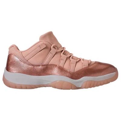 Shop Nike Women's Air Jordan Retro 11 Low Basketball Shoes, Pink